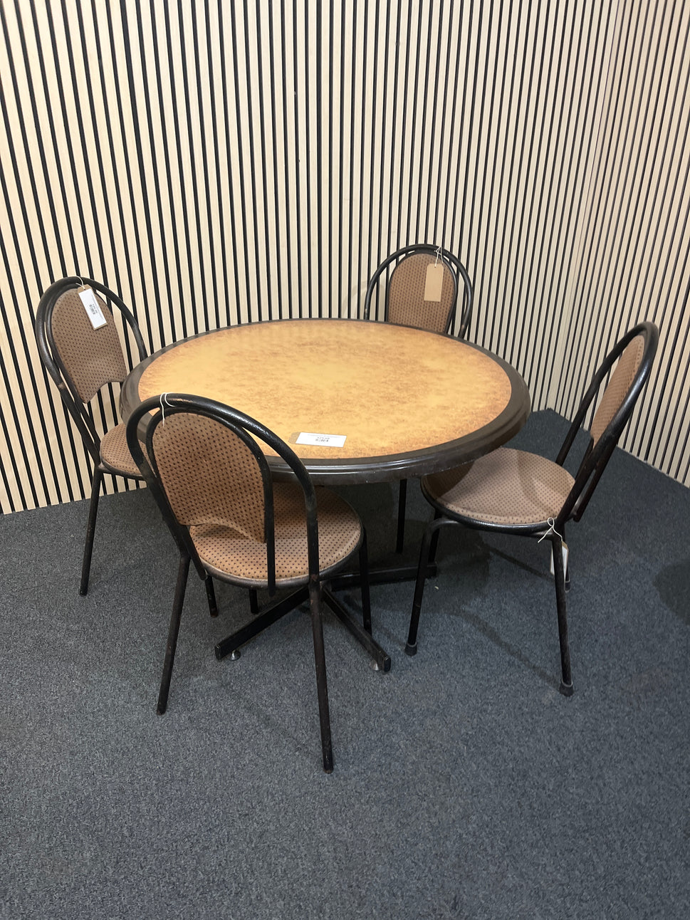 Circular black trim kitchen table with 4 no. black tubular metal framed, brown fabric seat chairs 1425