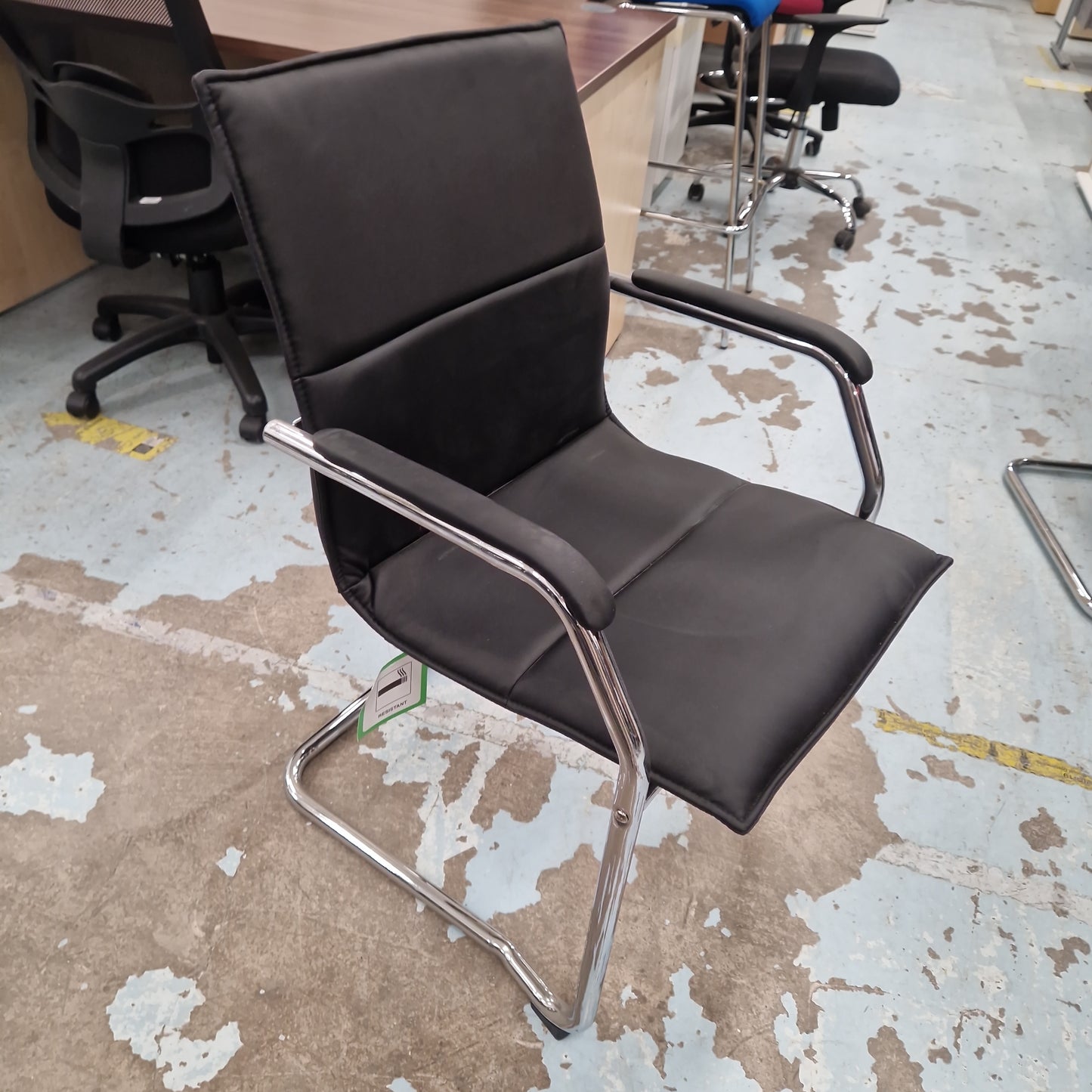 Essen stackable meeting room cantilever chair - black or grey faux leather