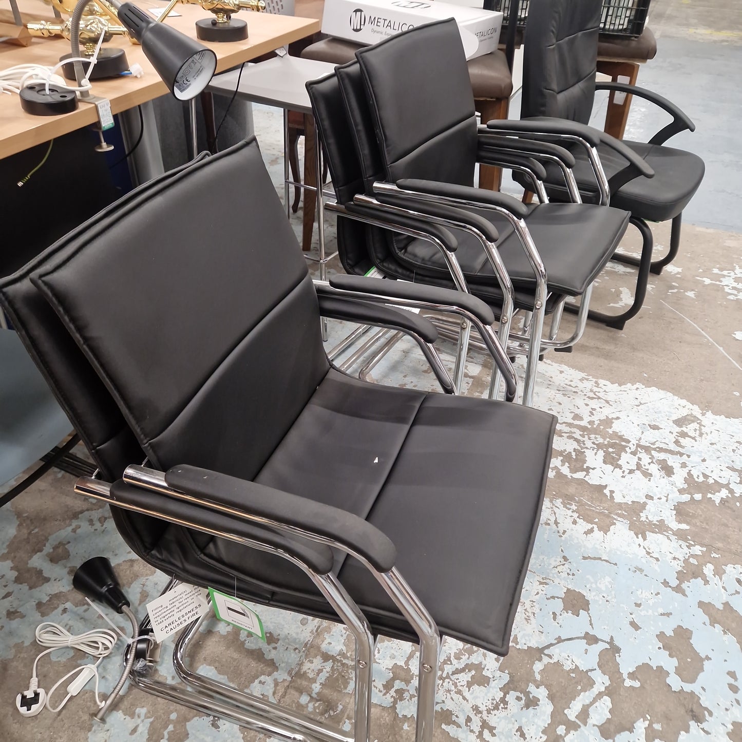 Essen stackable meeting room cantilever chair - black or grey faux leather