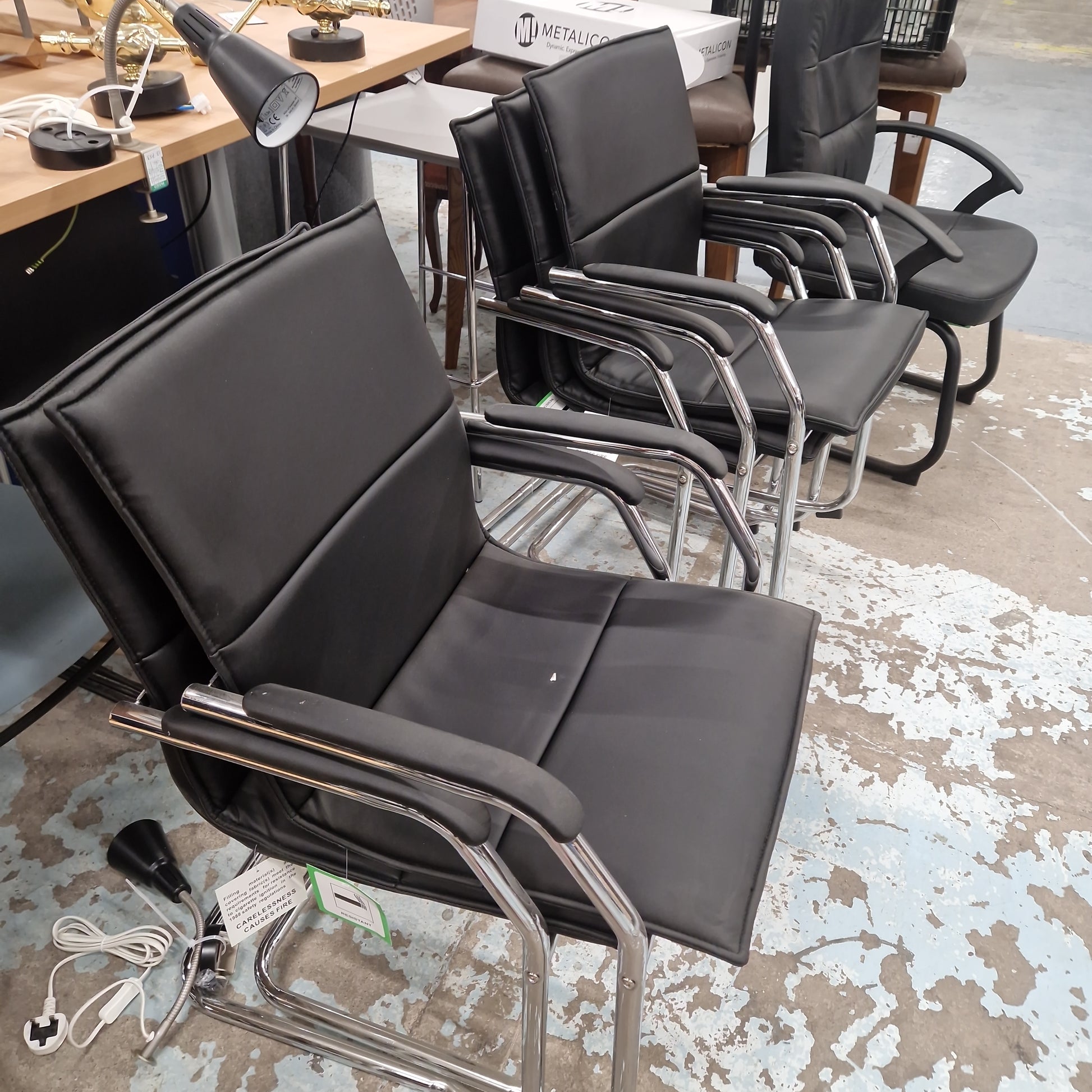 Essen stackable meeting room cantilever chair - black or grey faux leather