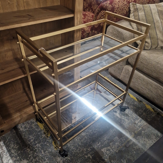 Small tiered brass trolley glass shelves on castors  Q3223