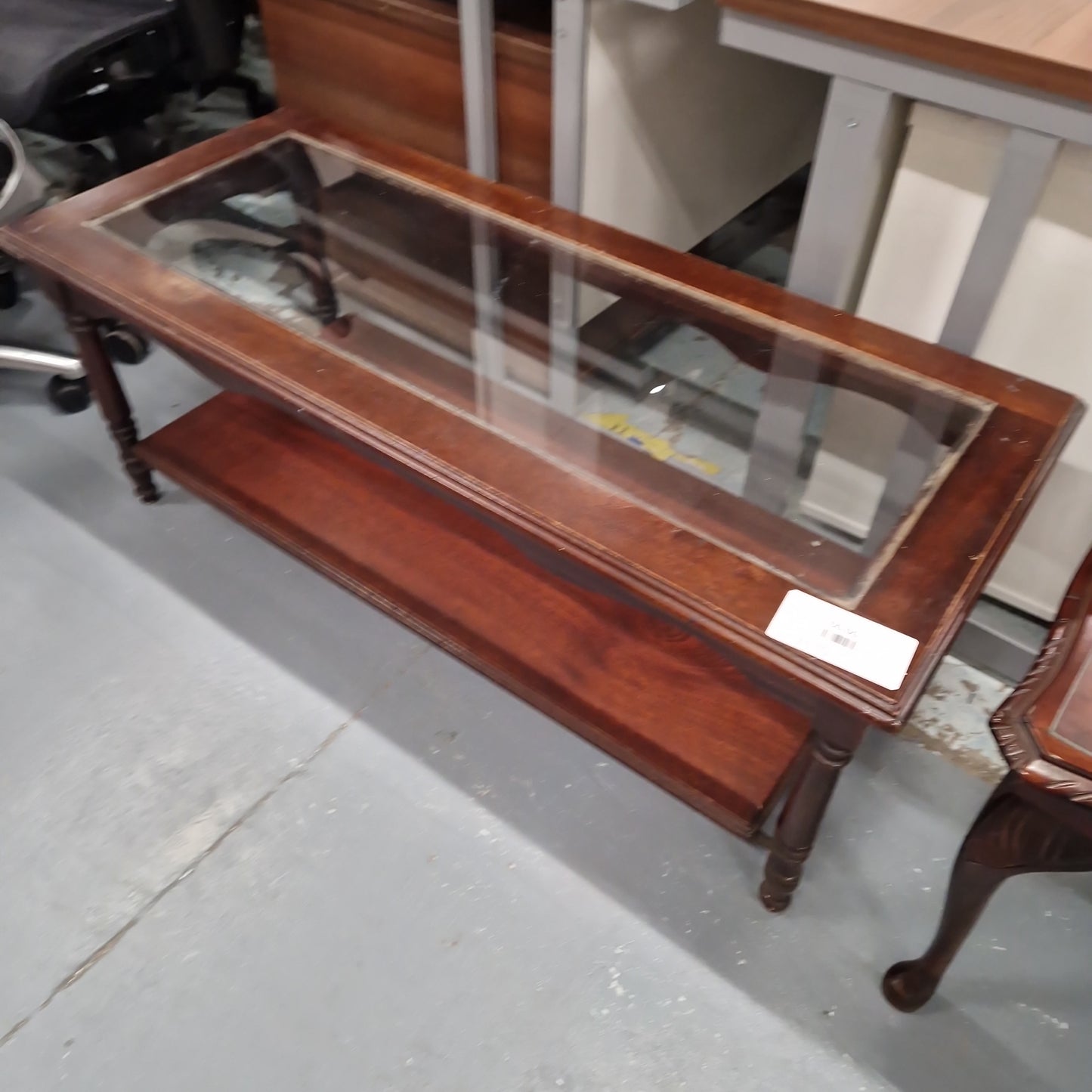 Mahogany coffee table with glass centre top