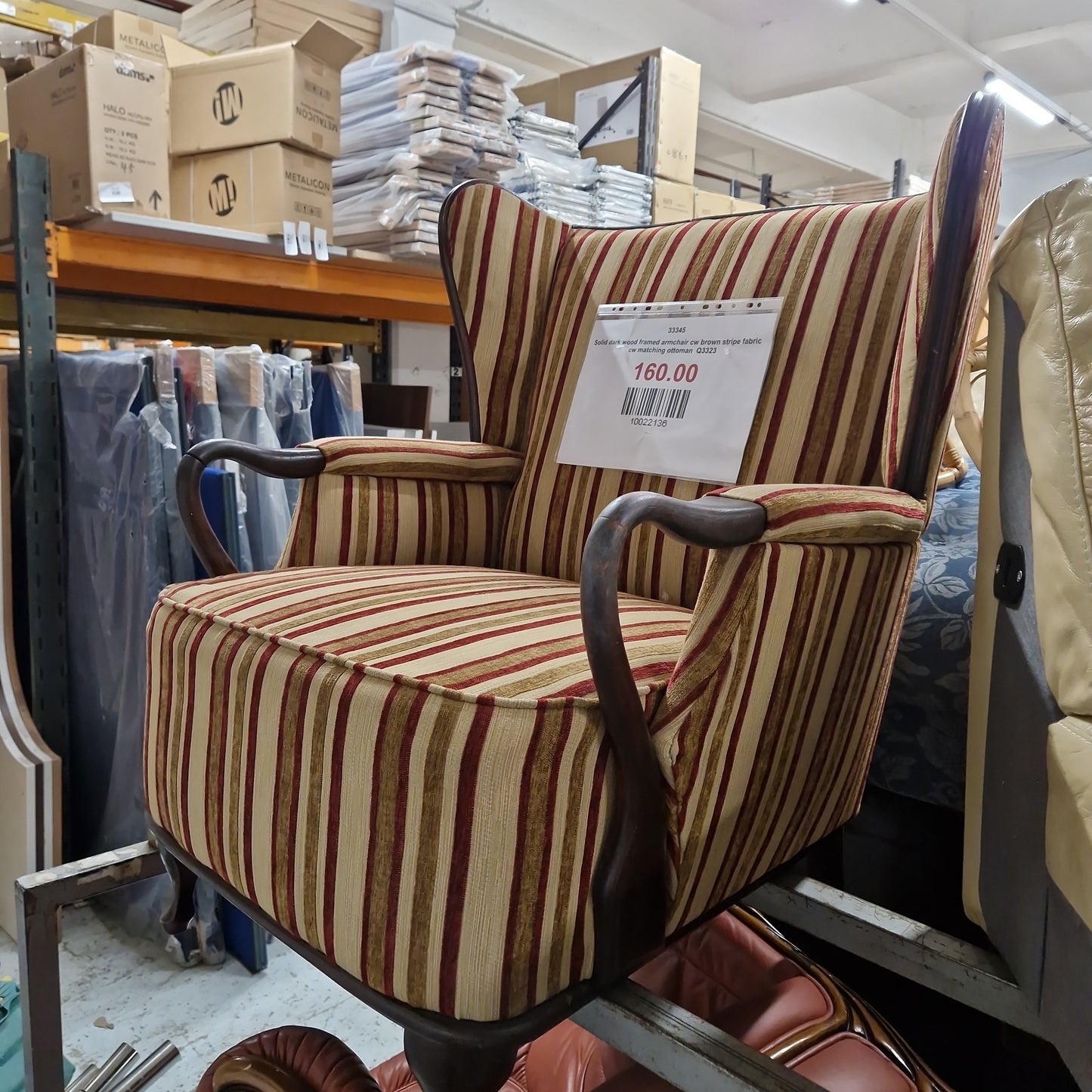 Solid dark wood framed armchair cw brown stripe fabric cw matching ottoman