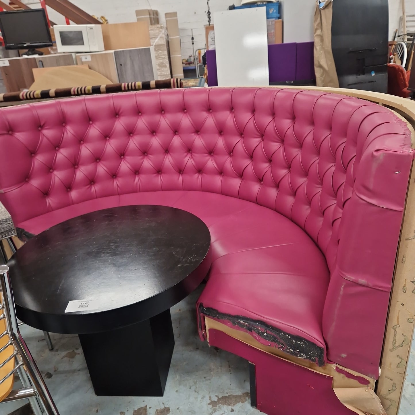Curved lounge sofa in pink leatherette button back with zebrano backing 1160x3120Wx730Dm, seat dims 470mm deep