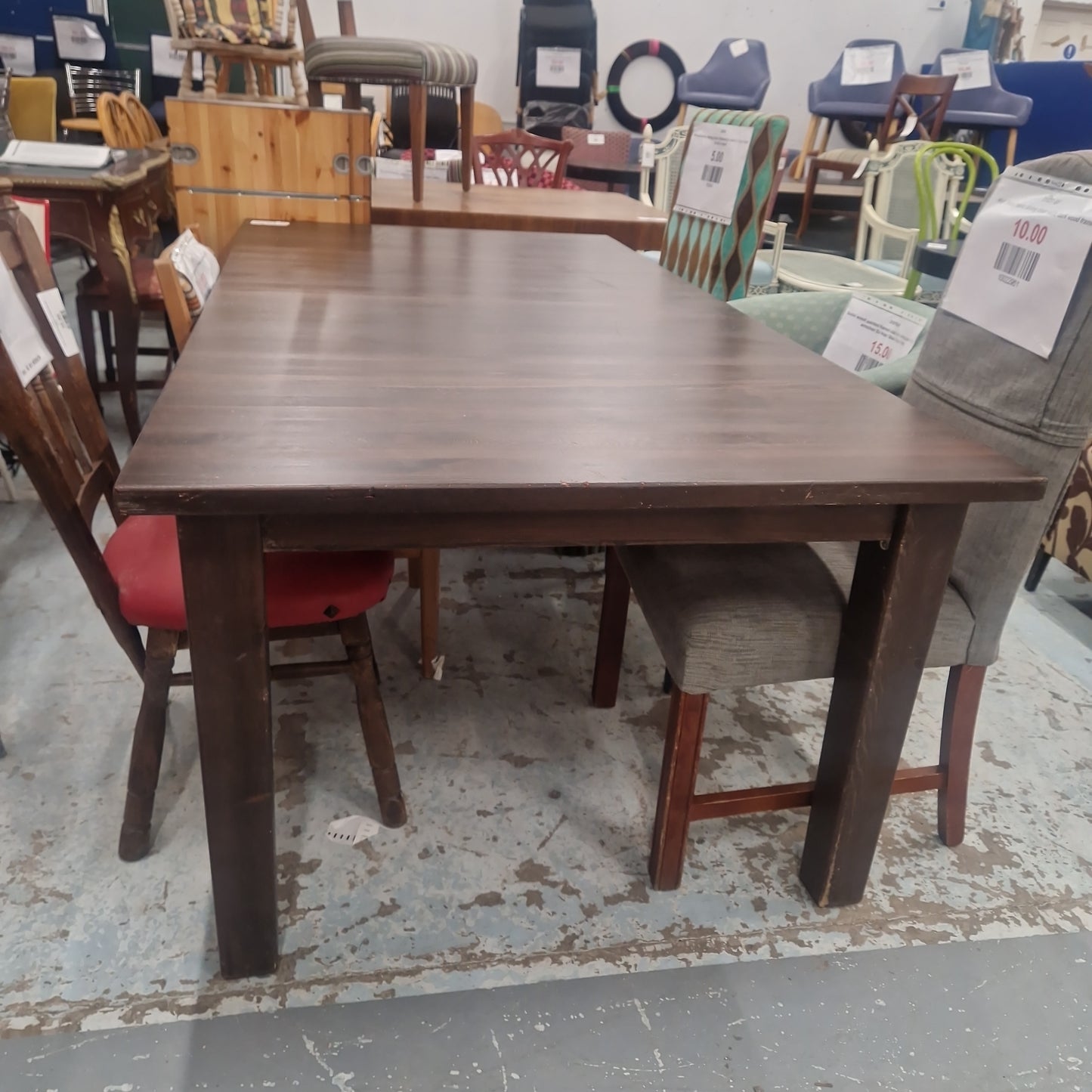 Solid dark wood stained extendable kitchen table