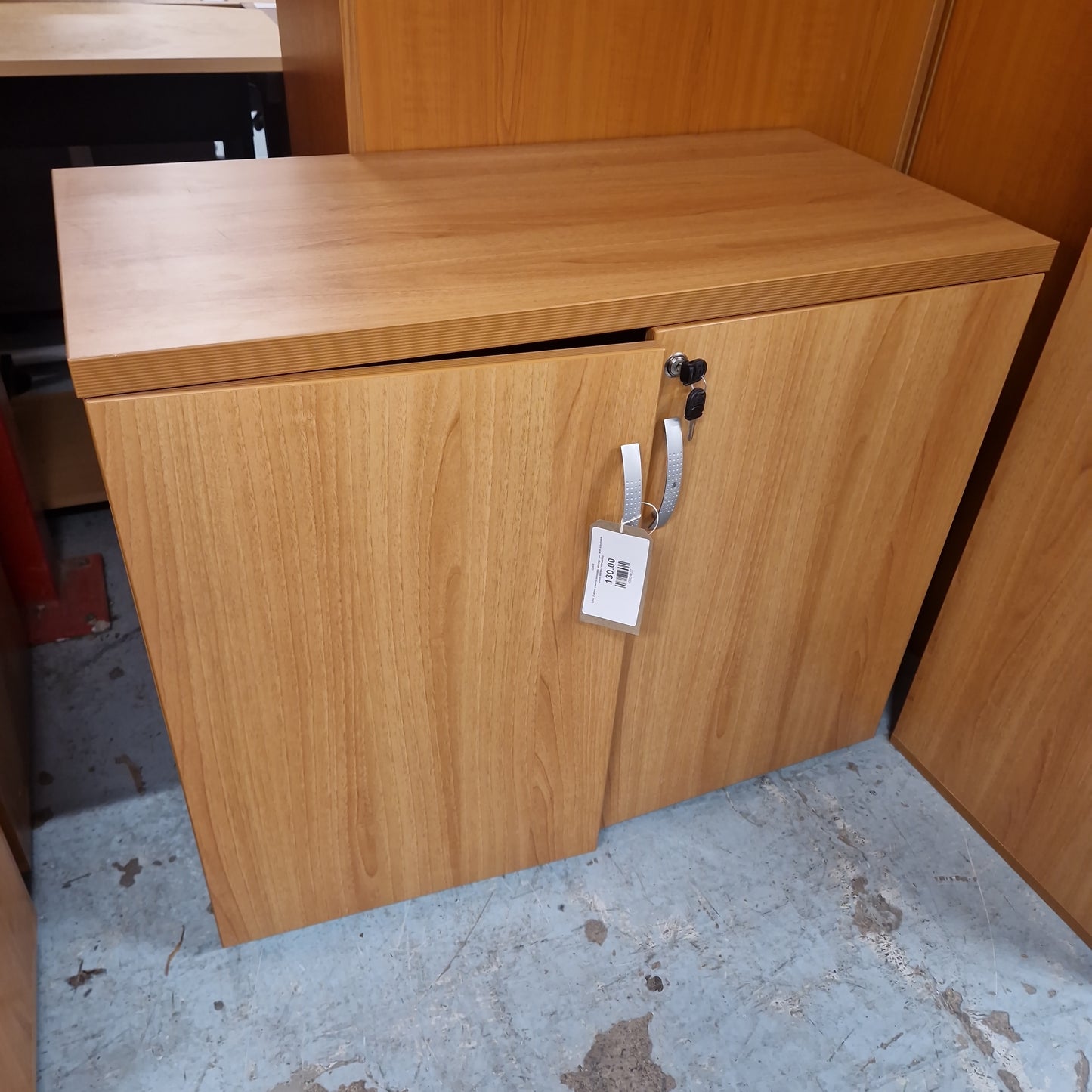 Low 2 door cherry laminate storage unit with adjustable shelf 900Wx745Hx450D