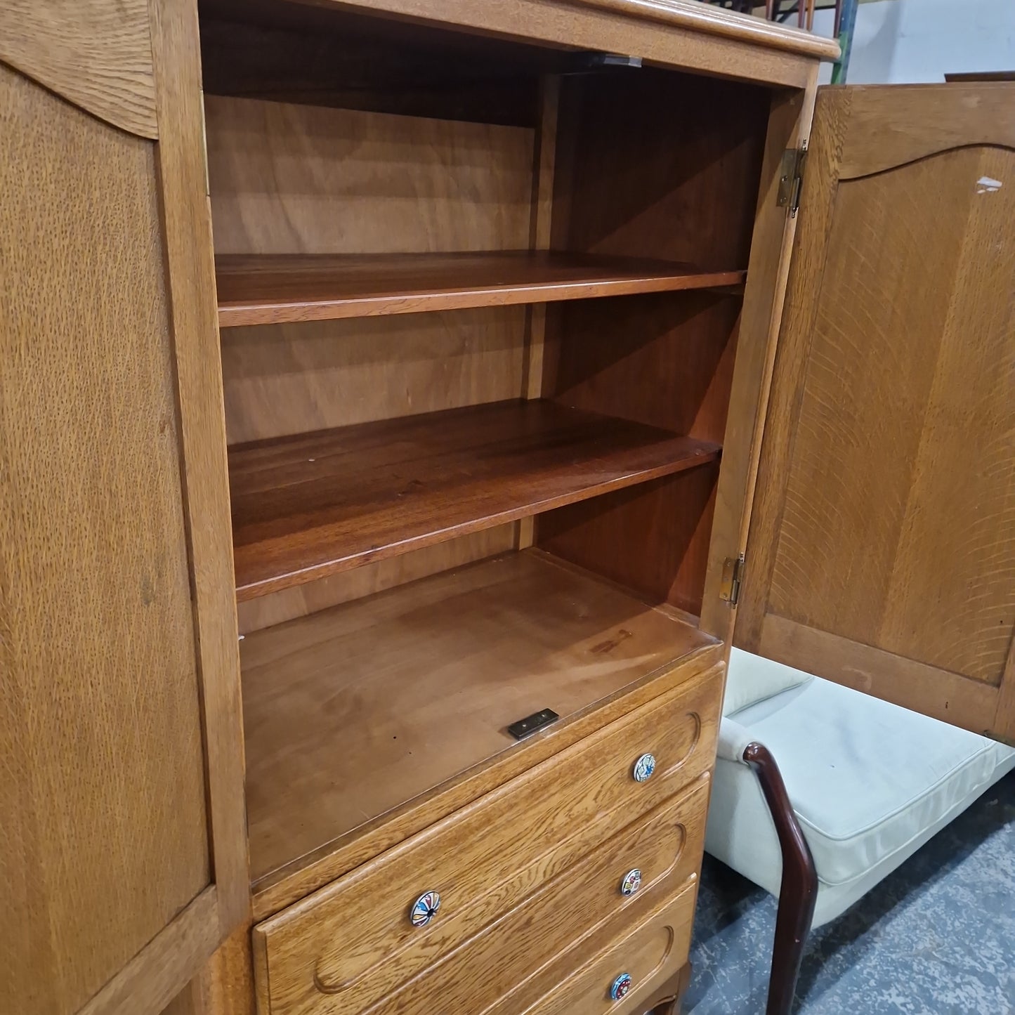 Tall oak stained wardrobe with 3 drawers  Q4323