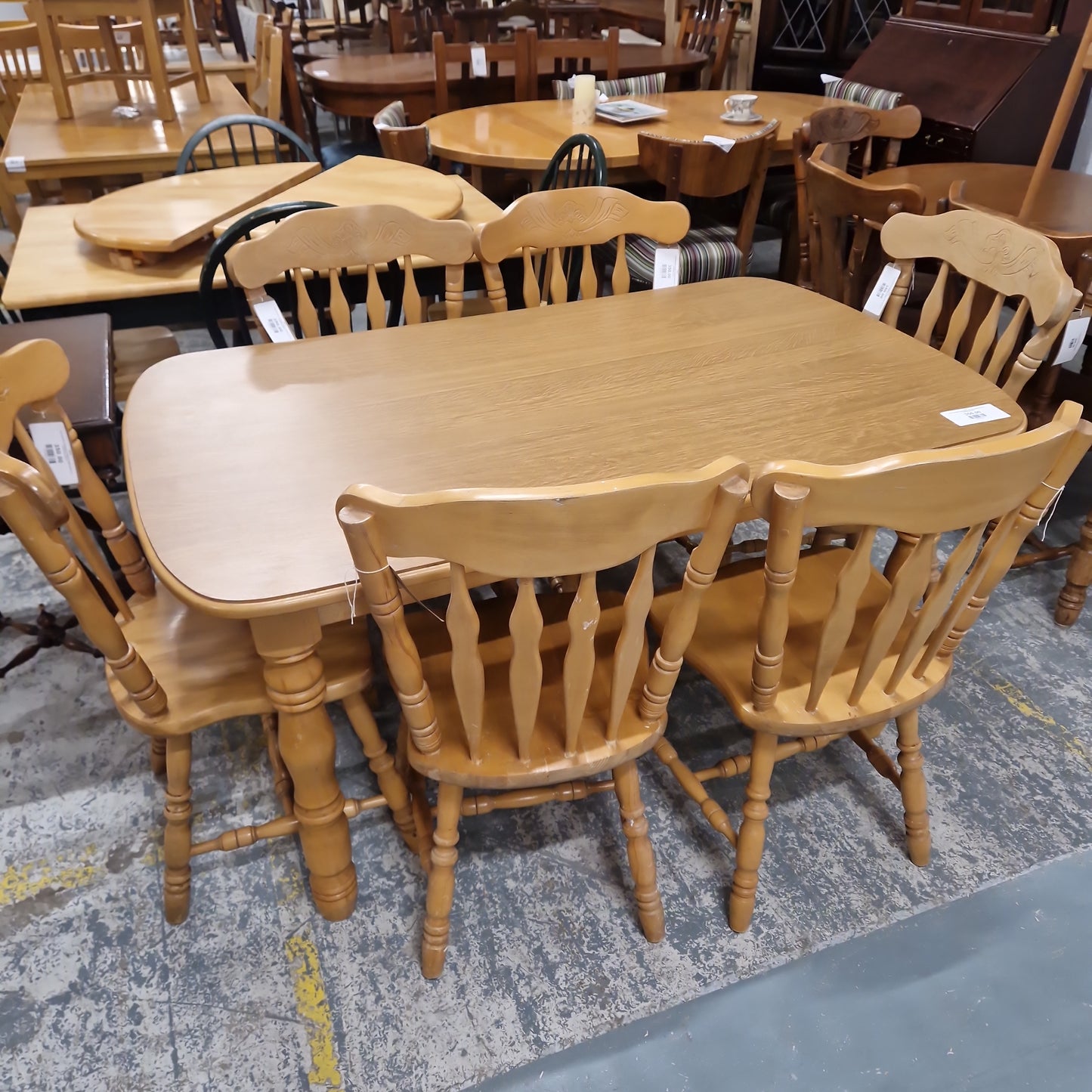 Oak laminate rectangular kitchen table with 6 no. matching chairs