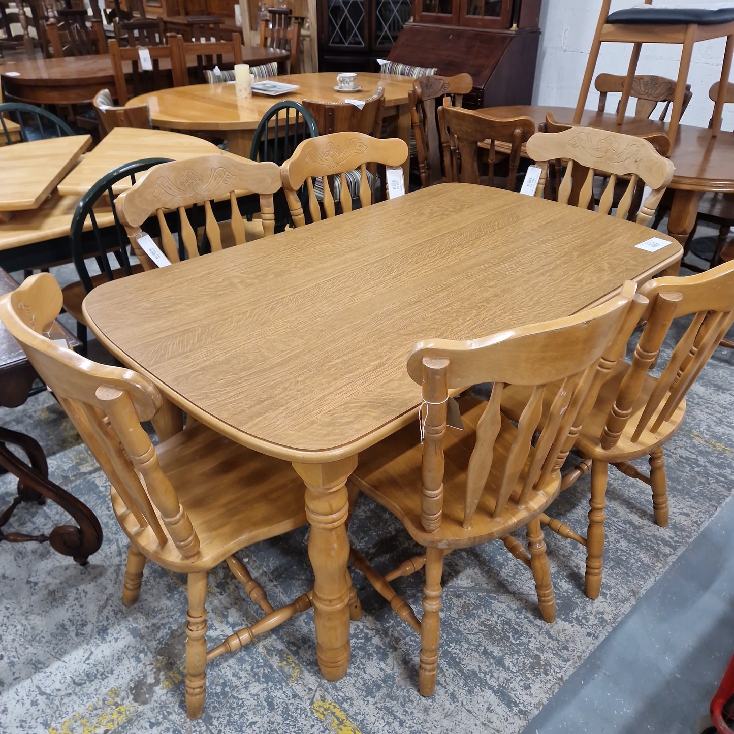 Oak laminate rectangular kitchen table with 6 no. matching chairs