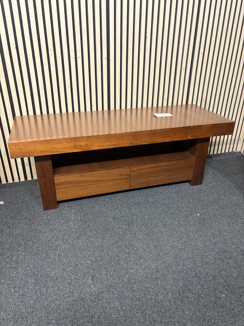 Low-profile dark wood entertainment unit featuring two integrated storage drawers.  44709