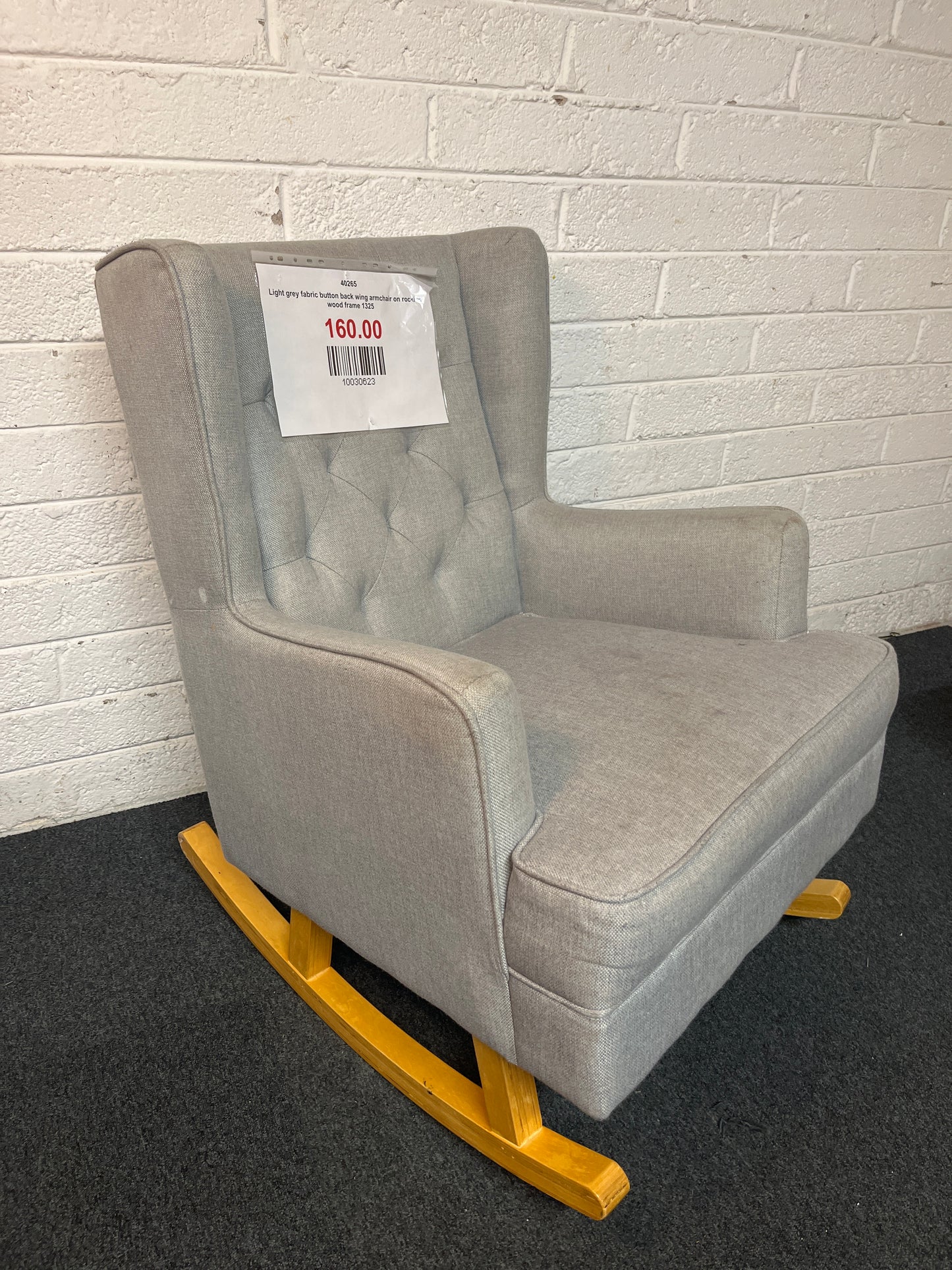 Light grey fabric button back wing armchair on rocking wood frame 1325