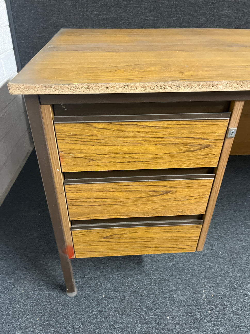 SECONDHAND teak laminate desk with fixed drawers on RHS