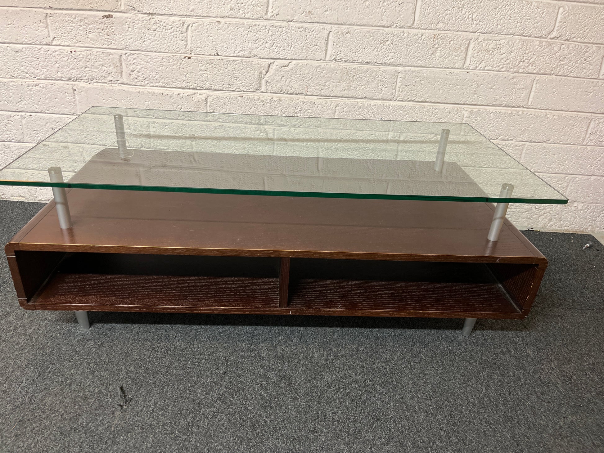 Modern dark wood laminate coffee table with glass top  1325