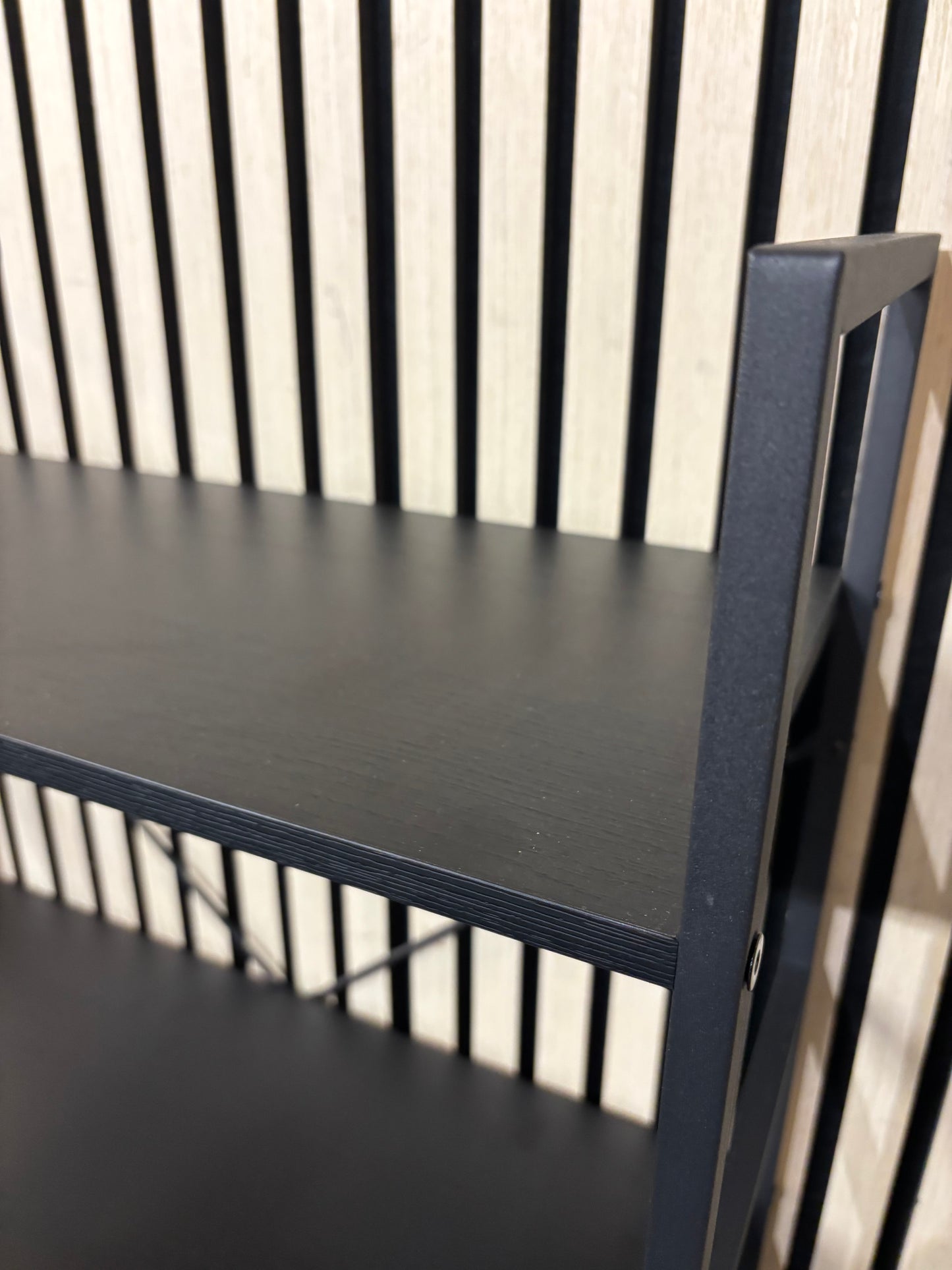 Tiered black metal open shelf unit 43610