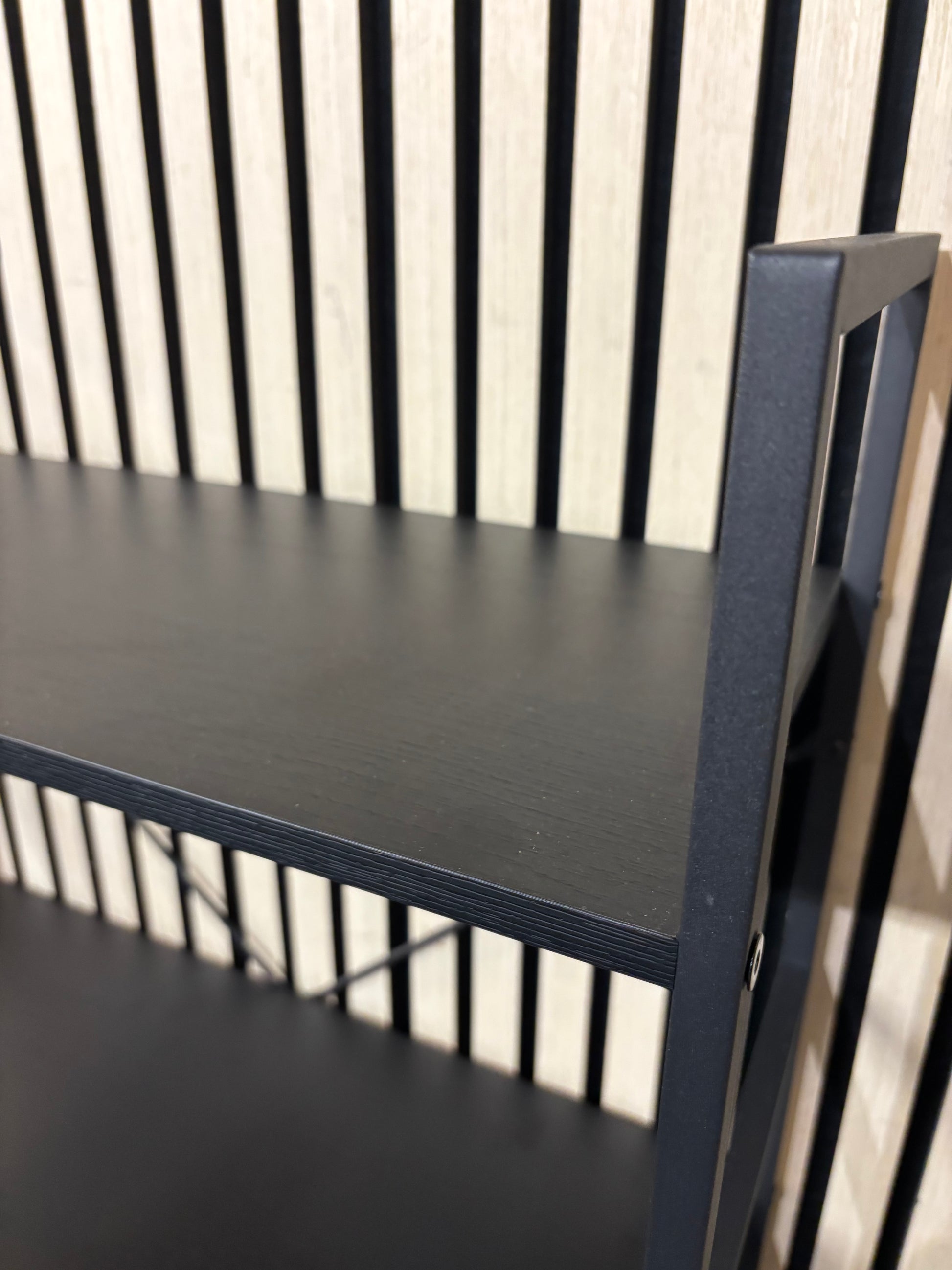 Tiered black metal open shelf unit 43610