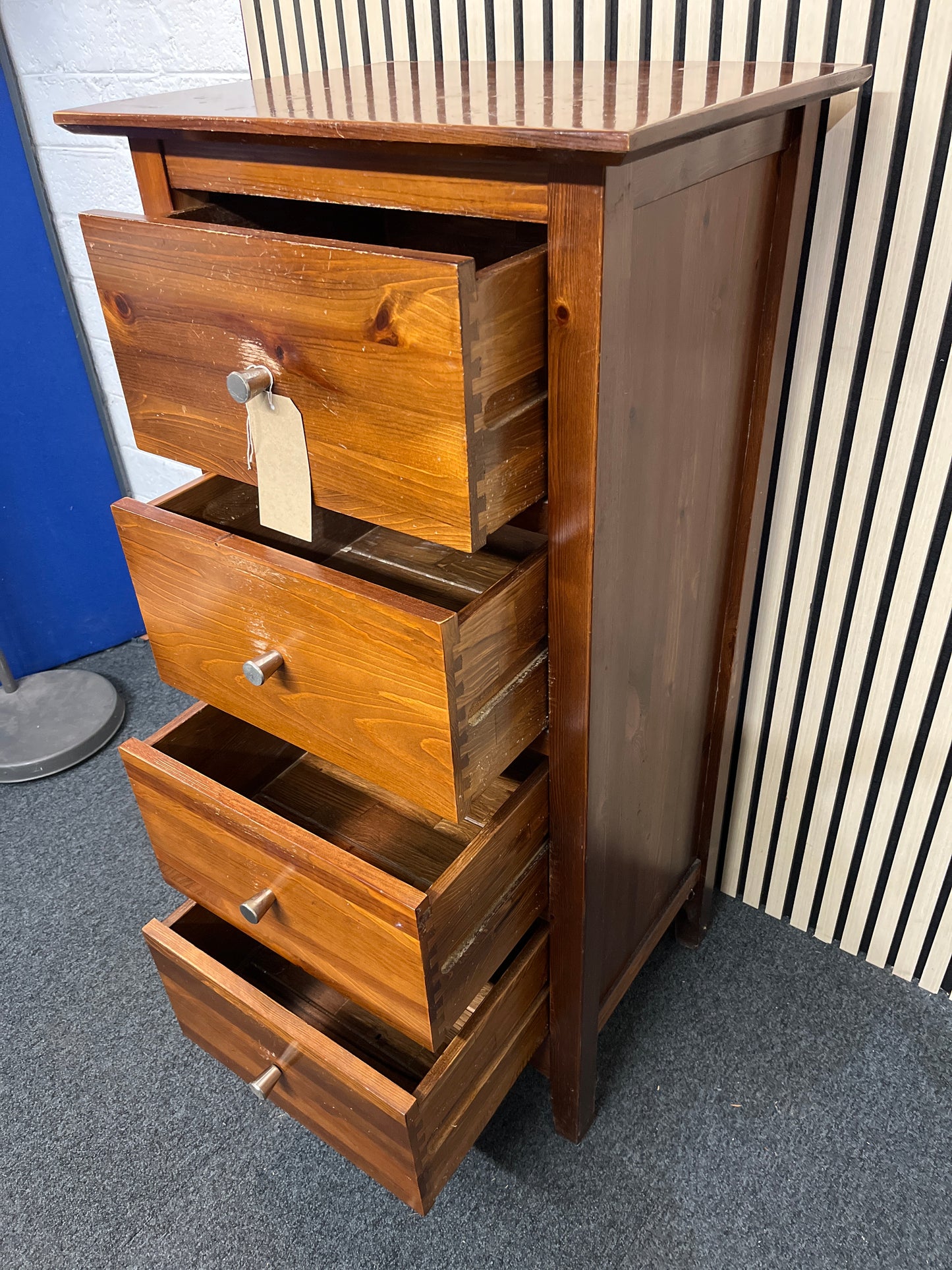 Tall dark pine stained 4 drawer tall boy (H 120 x W 56 x D 46 cm)