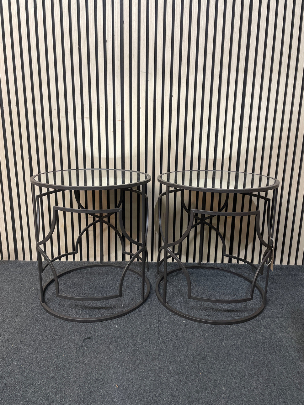 Pair of black metal and glass circular occasional tables 2226