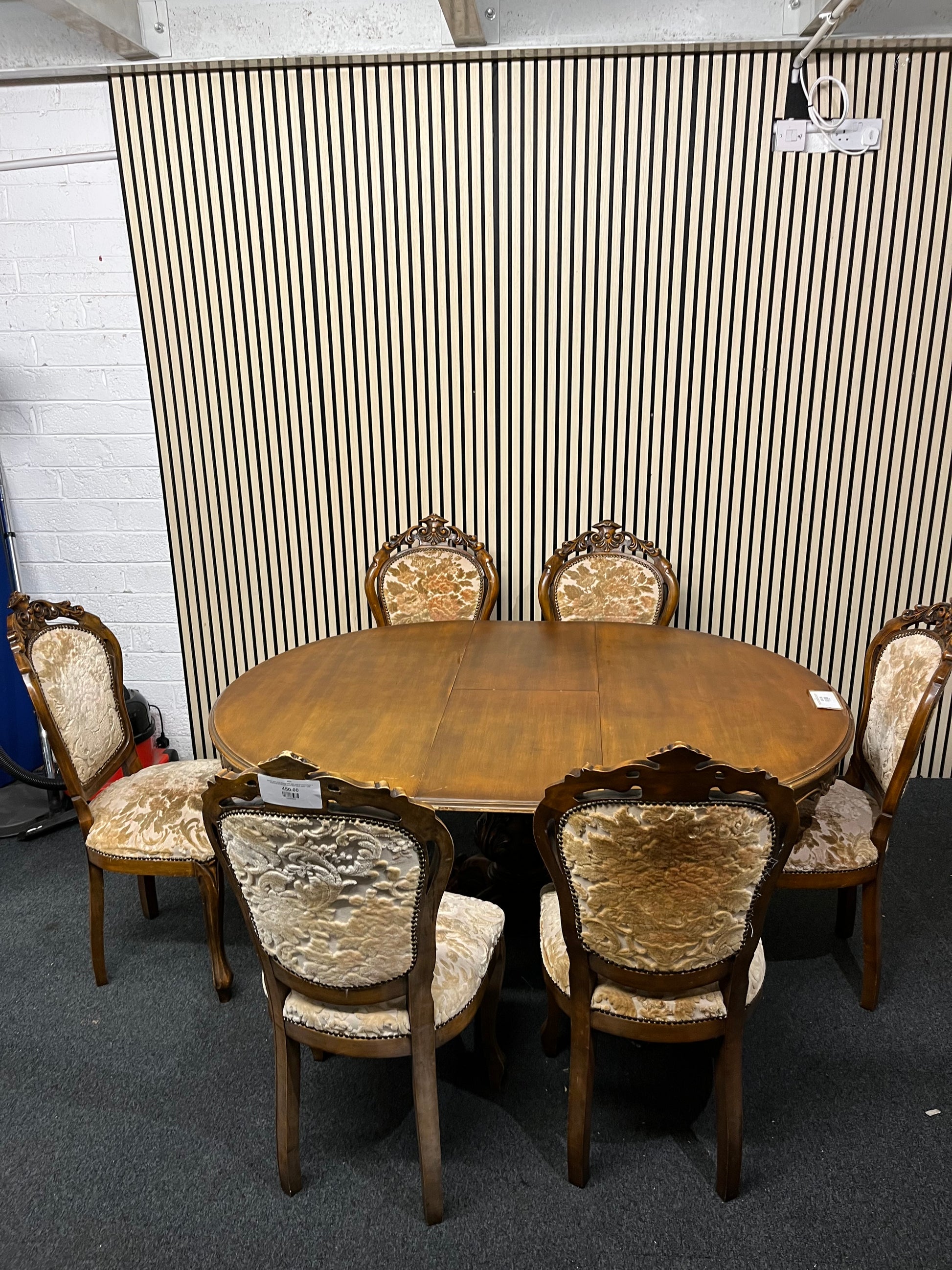 Ornate dark wood dining table with central column base 6 matching darkwood framed floral fabric seats  2325