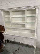 Large white dresser featuring glass shelves and decorative scalloped edges.  44522
