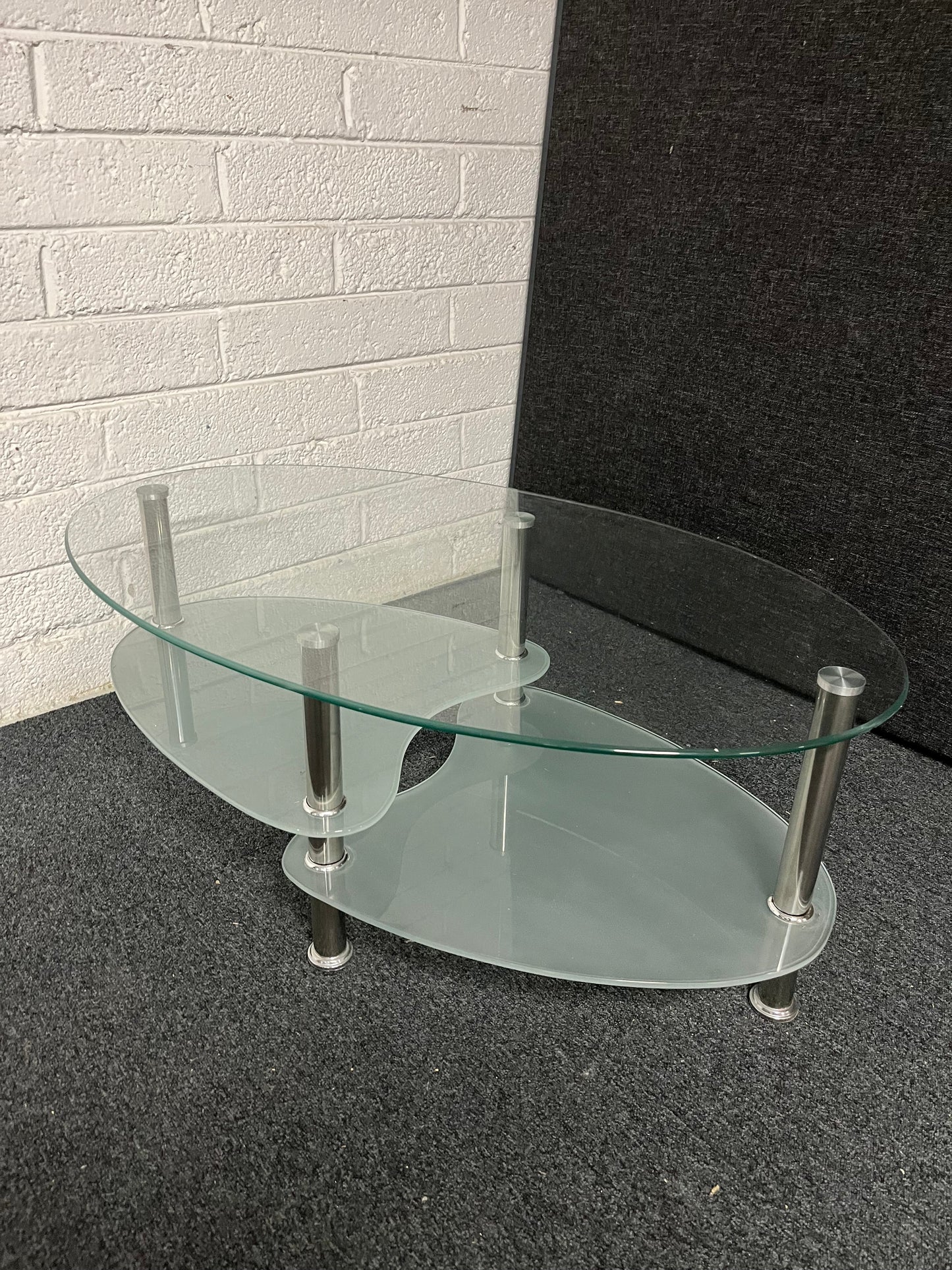 Oval glass low tiered coffee table  1225
