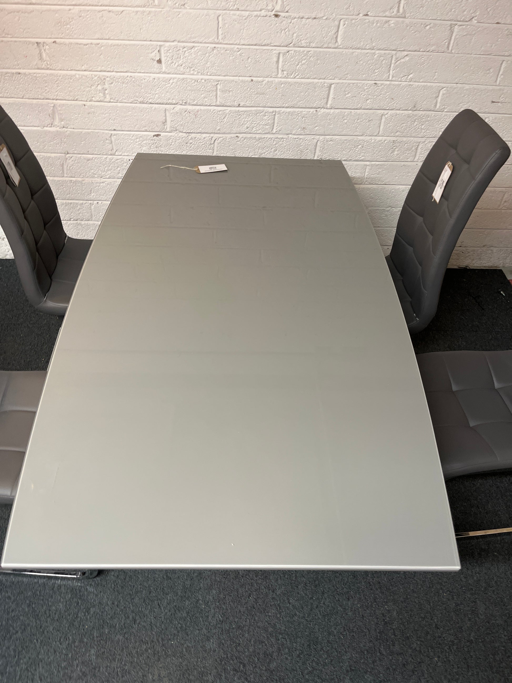 Grey glass top rectangular dining table (W 160 x D 90 cm) and 4 grey leatherette metal framed dining chair 1325