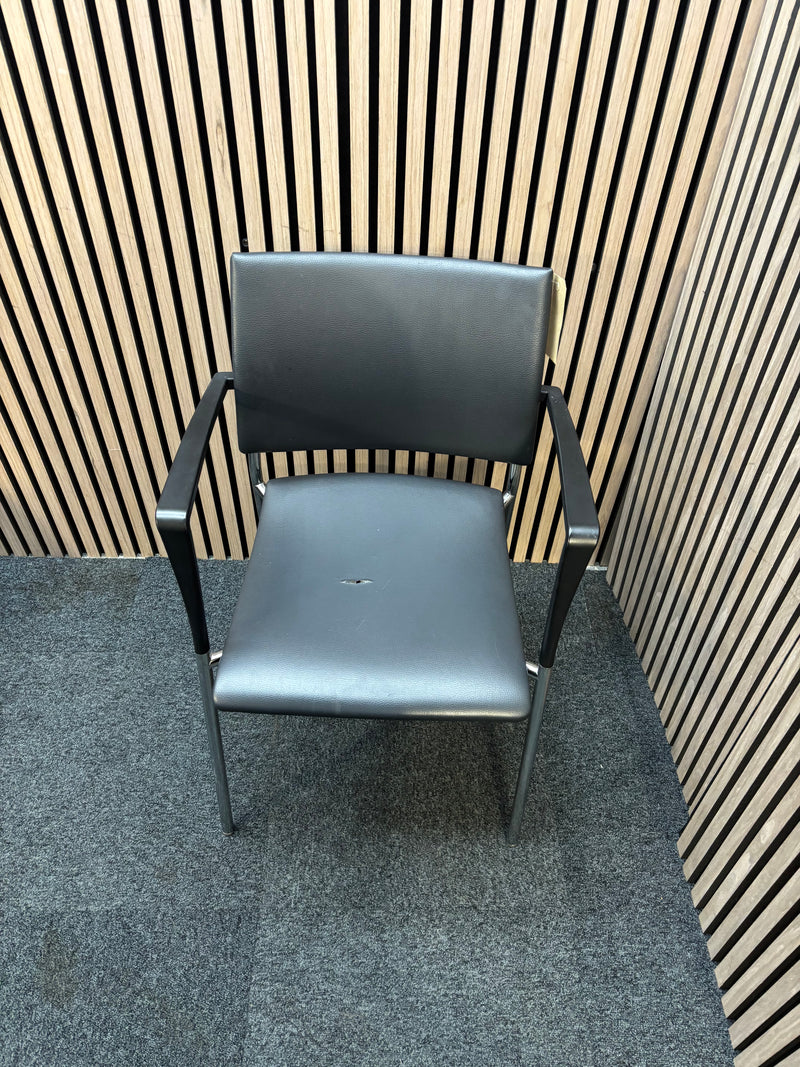 Black pu leatherette stacking chair with arms