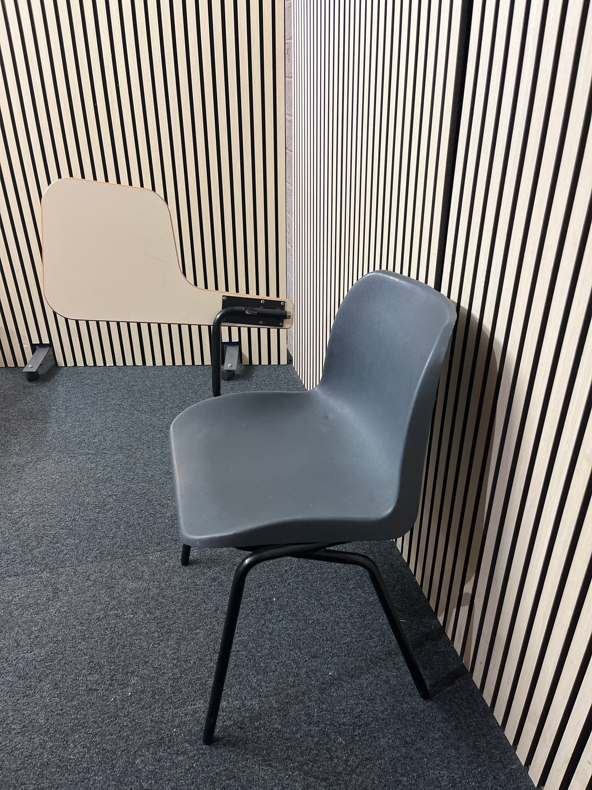 Polyprop stacking chair, black metal frame with wooden writing tablet 1425