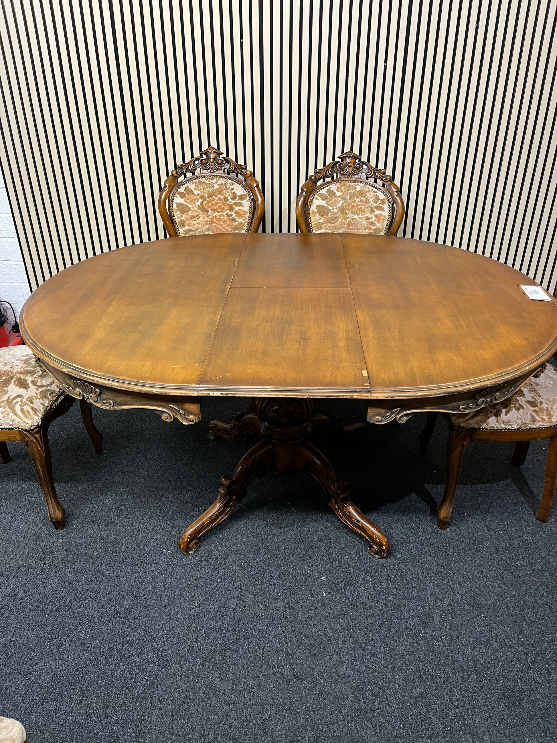 Ornate dark wood dining table with central column base 6 matching darkwood framed floral fabric seats  2325