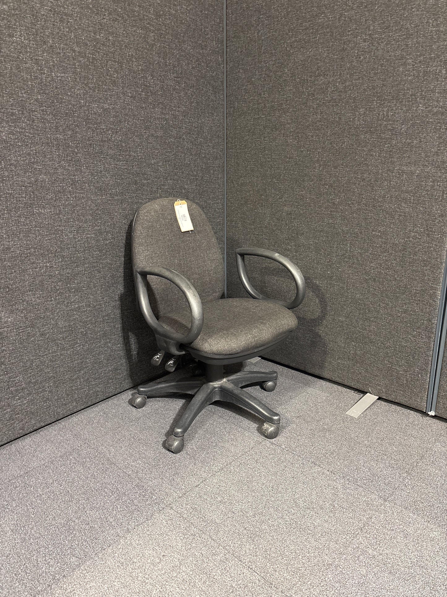 Secondhand Charcoal fabric low back height adjustable swivel chair with fixed loop arms, 5 star base. Price inc VAT. 7 no. matching in stock
