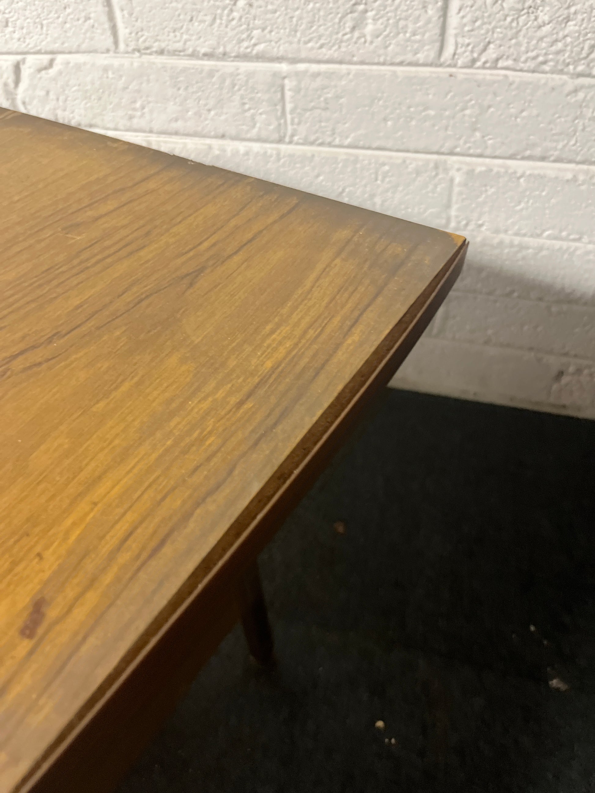 SECONDHAND teak laminate desk with fixed drawers on RHS