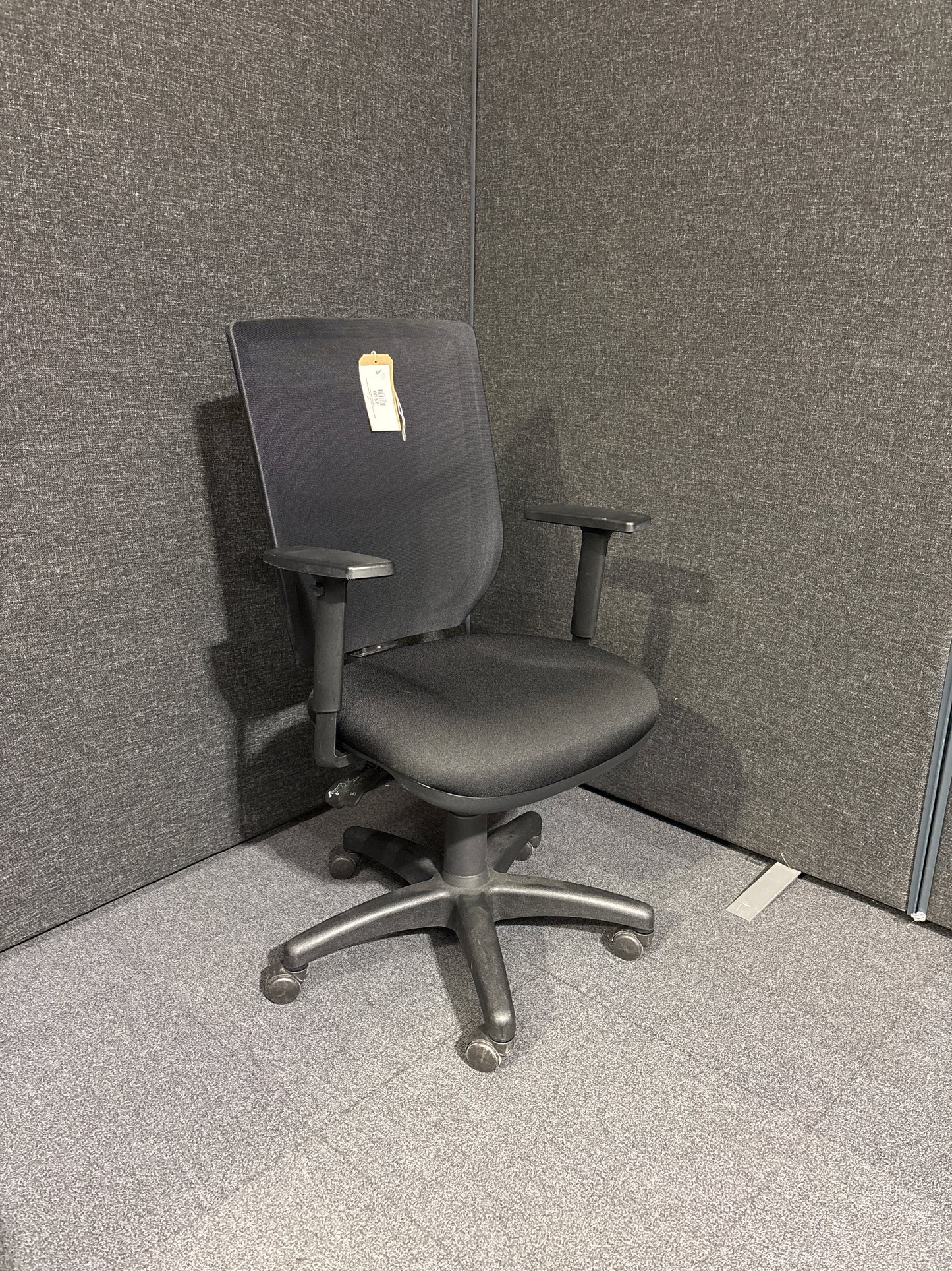 Black mesh back black fabric seat swivel chair with height adjustable arms