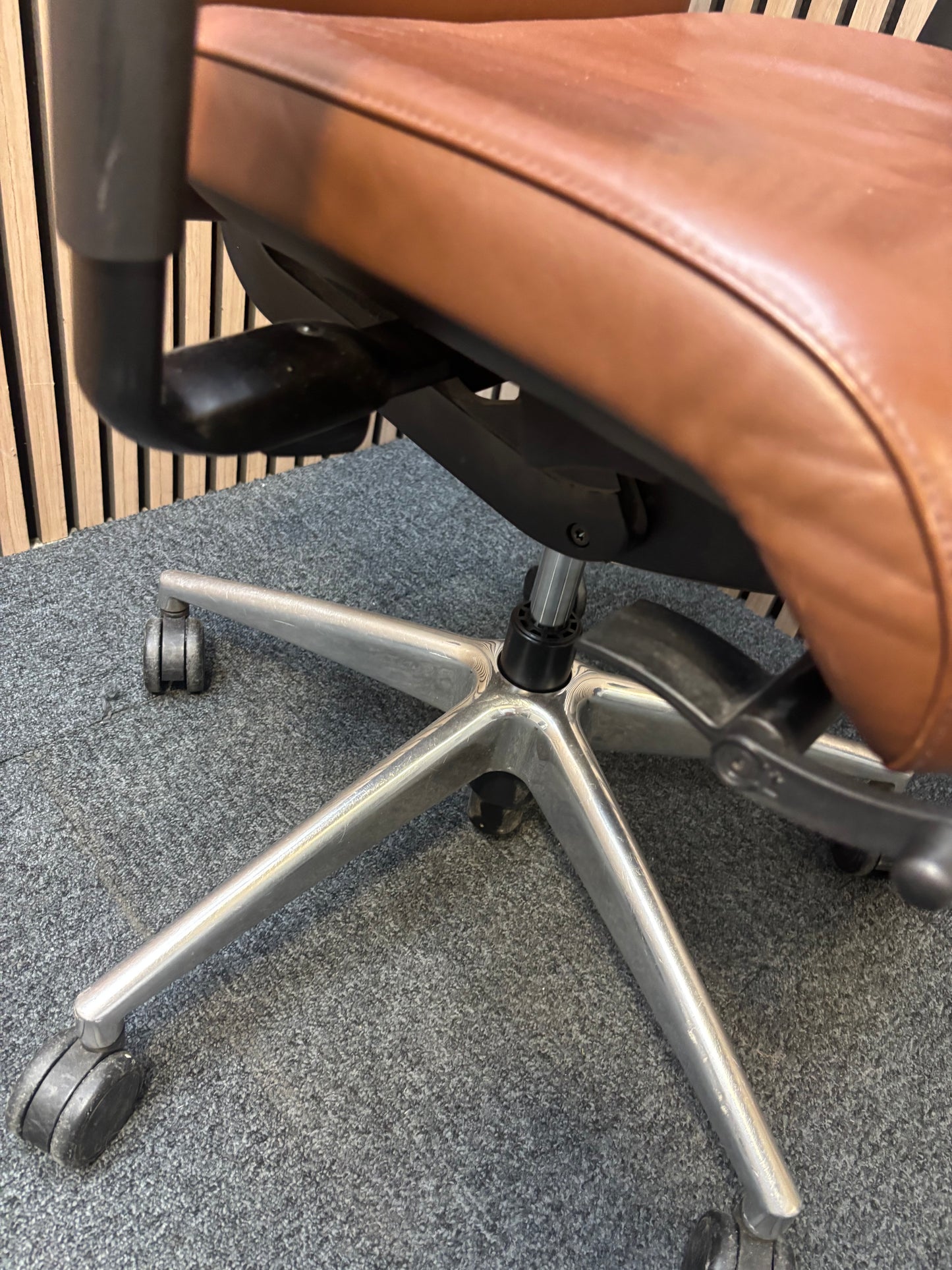 Girsberger high back brown leather multifunction swivel chair with adjustable arms and back rake with polished metal base on castors   J3910