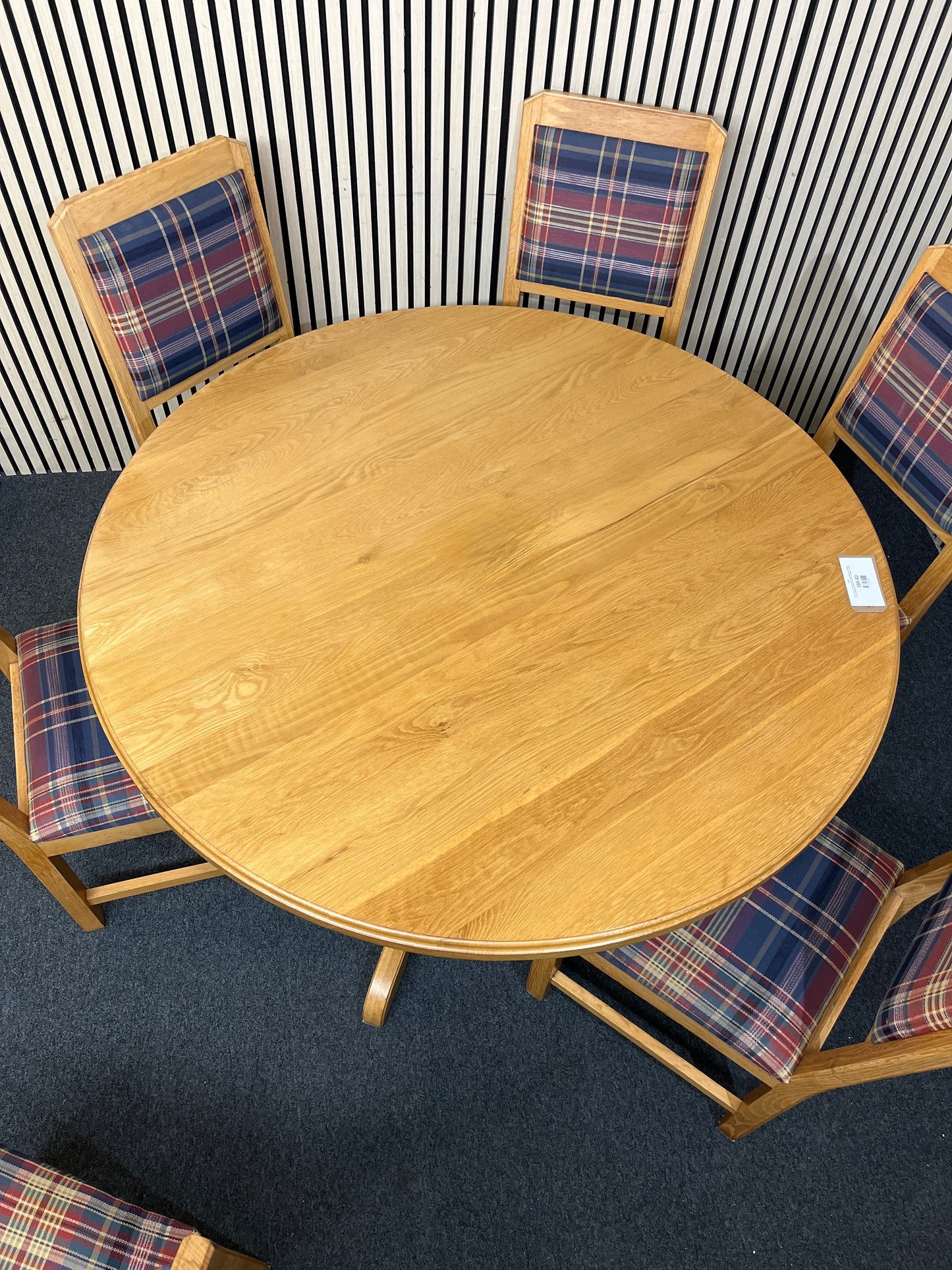 Round light oak table central base with five matching tartan upholstered chairs. (135 cm in diameter)  44285