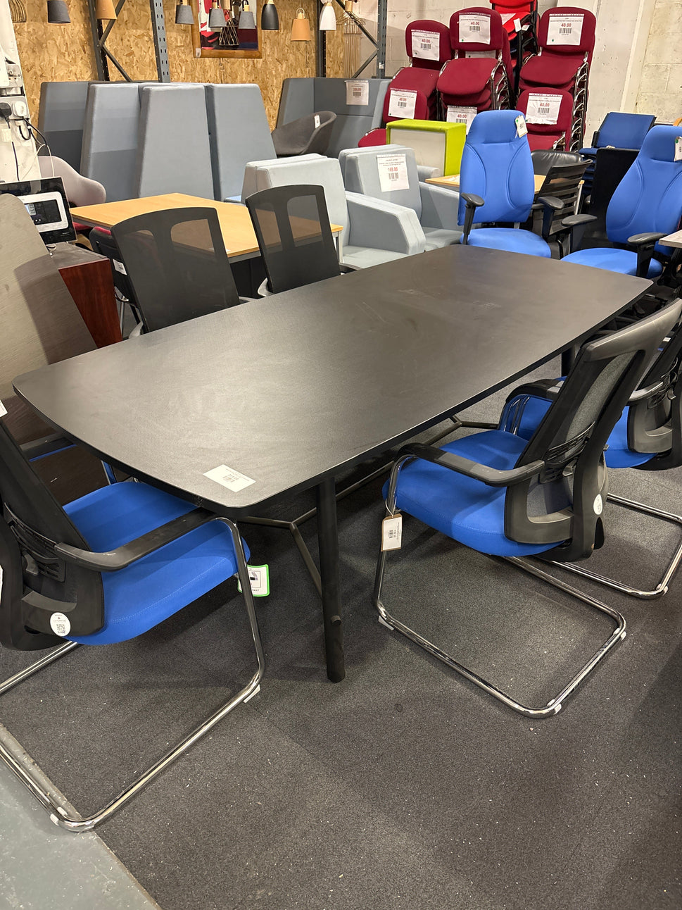 LIQUIDATED BLACK BARRELL SHAPE BOARDROOM TABLE 2.4M LONG