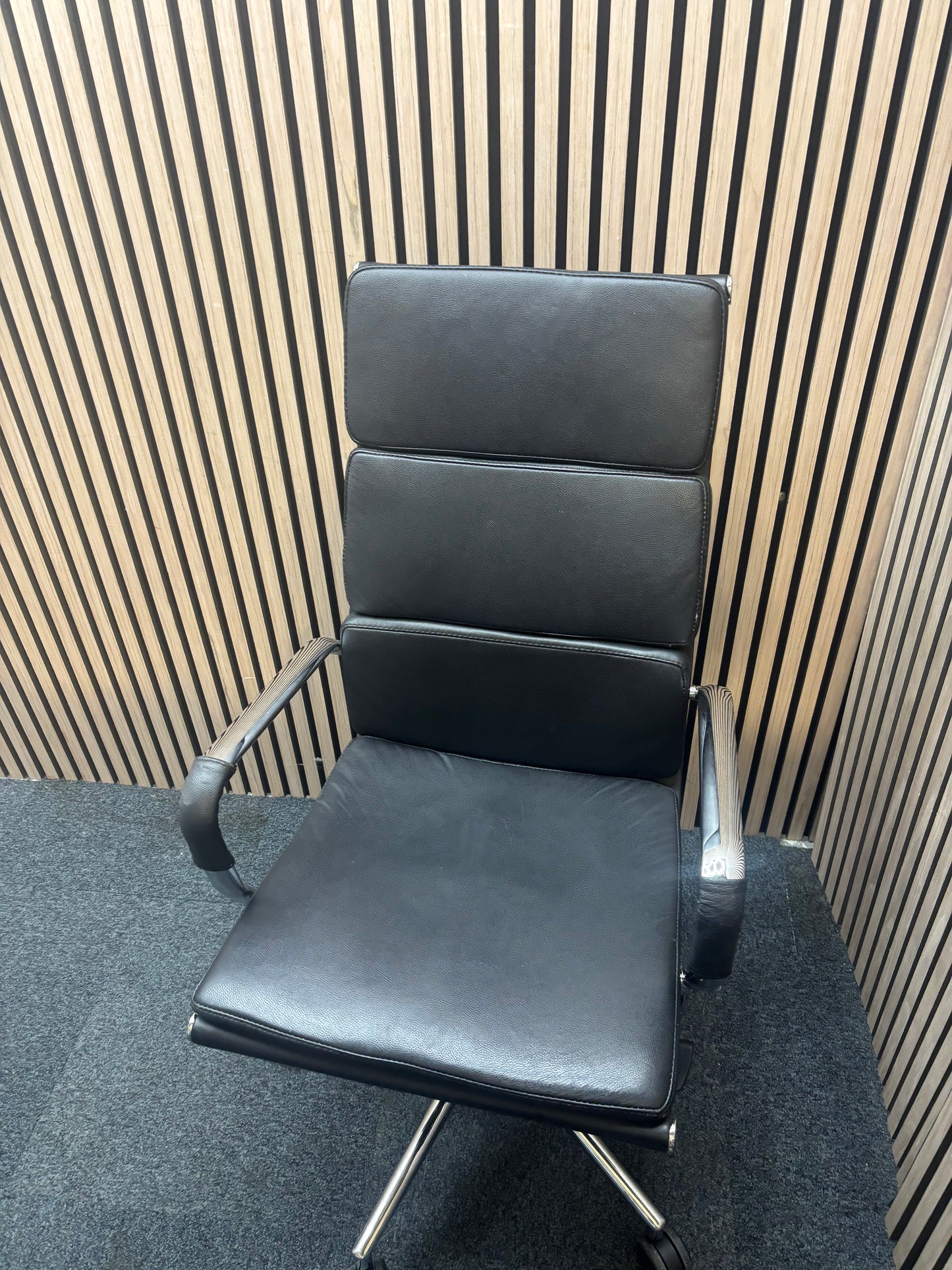 High back real black leather Eames style tall executive height adjustable swivel chair with polished chrome arms and base  J3912