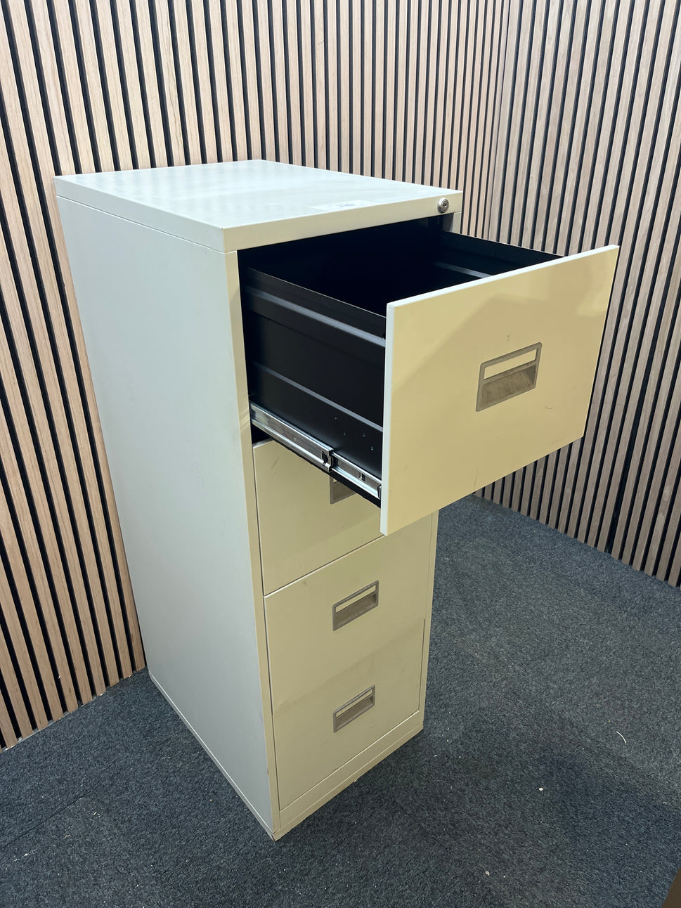 Grey metal 4 drawer filing cabinet