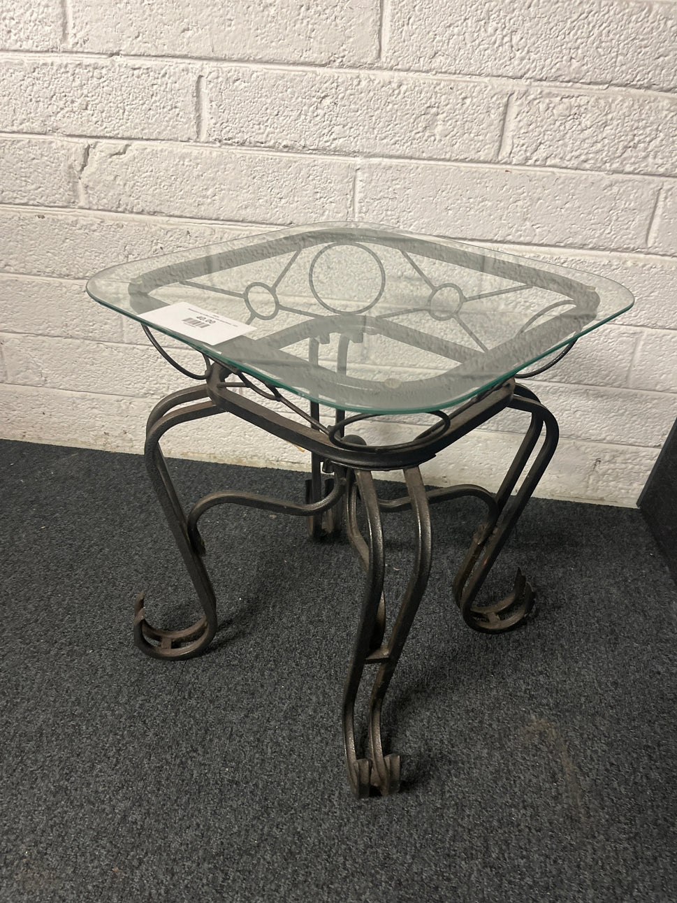 Small glass top coffee table with metal frame  1225