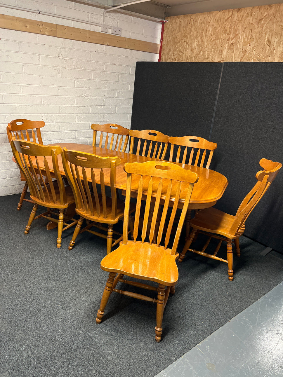 Large hardwood oval extendable dining table (L 155 - 215 x W 105 cm) with 8 no. matching high back solid wood chairs 2225