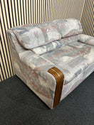Switch Patterned two-seater sofa with wooden arm accents 3 image