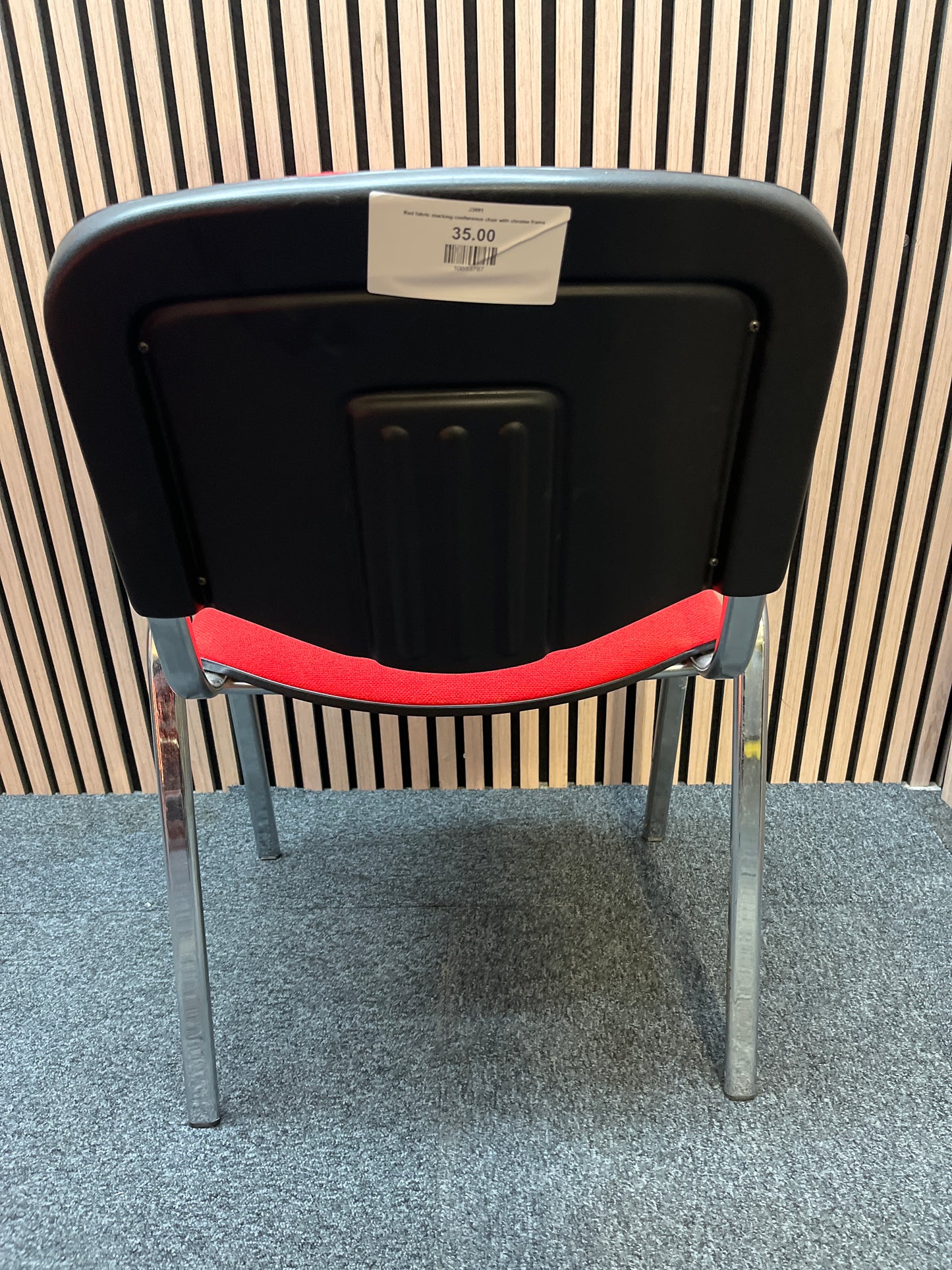 Red fabric stacking conference chair with chrome frame