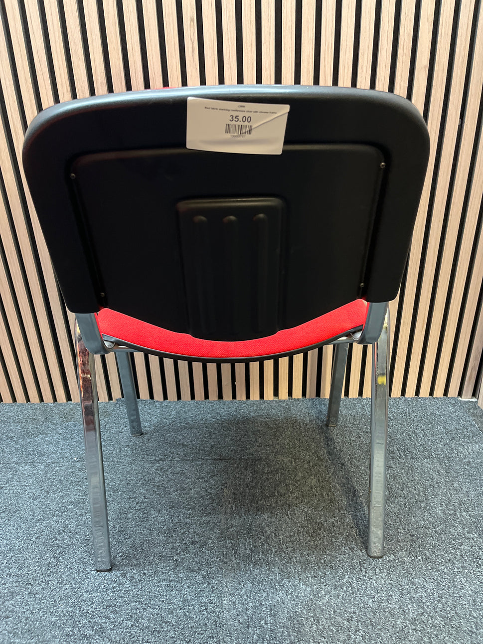 Red fabric stacking conference chair with chrome frame