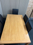 Rectangular beech dining table (L 150 x W 90 cm) with 6 black leatherette dining chairs 43505