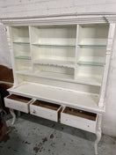Large white dresser featuring glass shelves and decorative scalloped edges.  44522