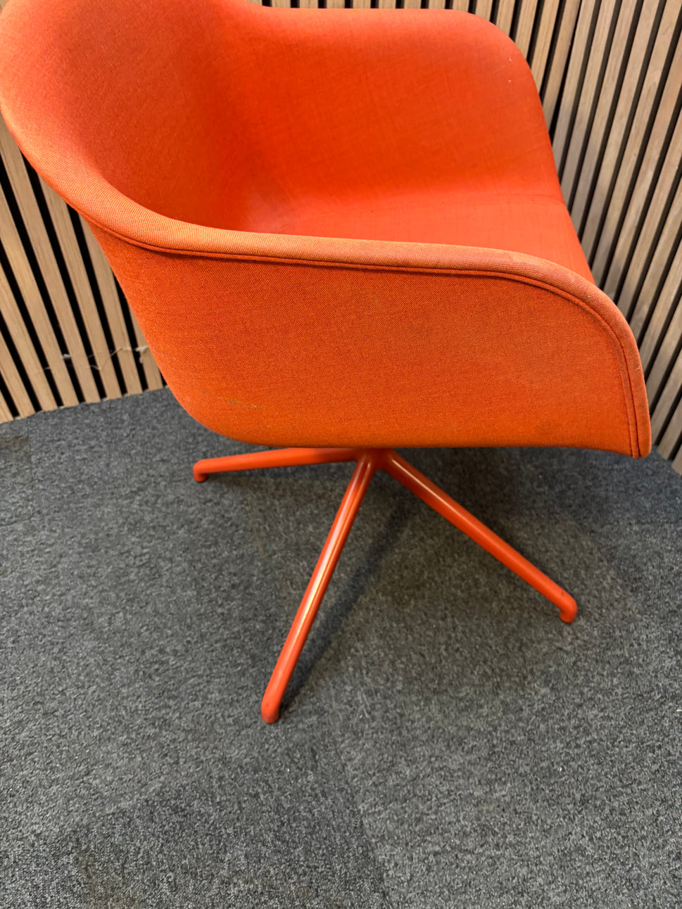 Muuto fibre armchair with a swivel base in manner 2 fabric with red painted metal spider base   J3911