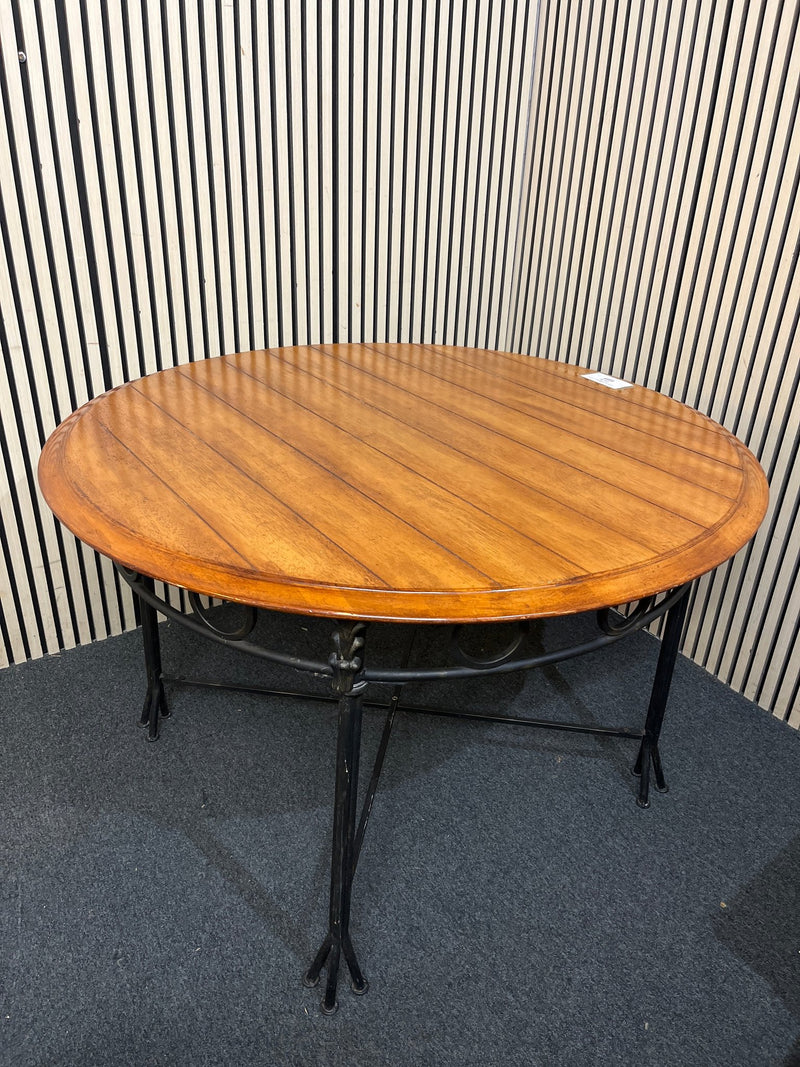Round slatted wood top with decorative black metal base.(125 cm diameter)  44256 - image 1