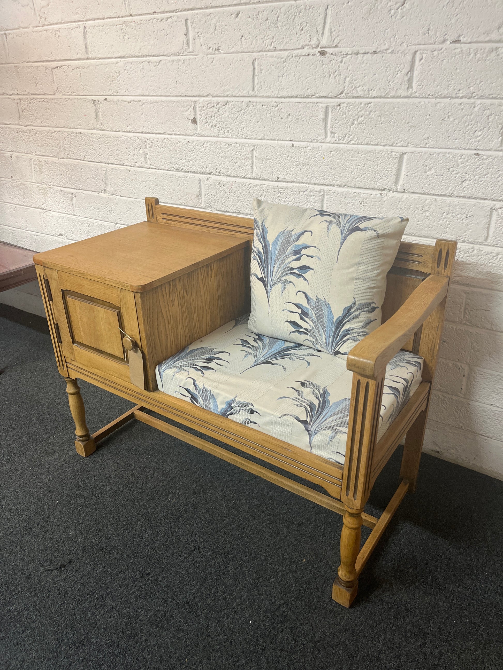Oak telephone table with blue and cream floral fabric seat and storage drawer 1325