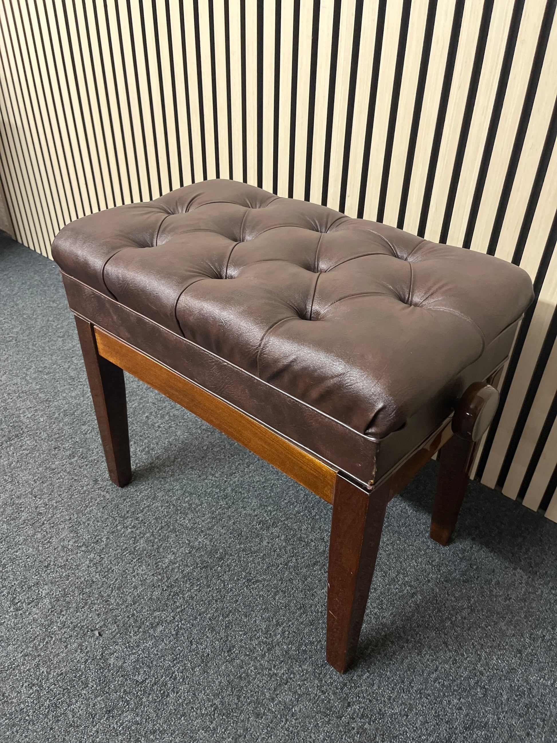 Solid wood frame leather top adjustable piano stool with leatherette seat studded seat and lift up cover with red felt internal fabric 2325