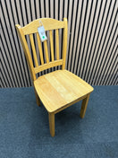 Set of two light wood dining chairs with slatted backrests.  44409