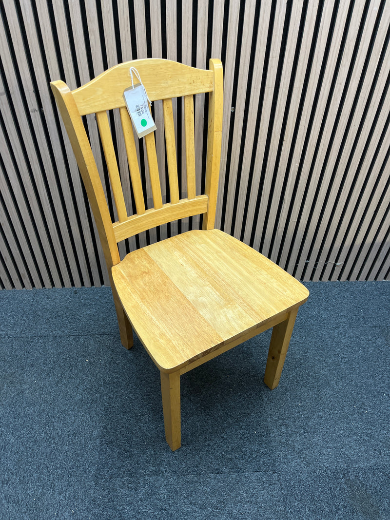 Set of two light wood dining chairs with slatted backrests.  44409
