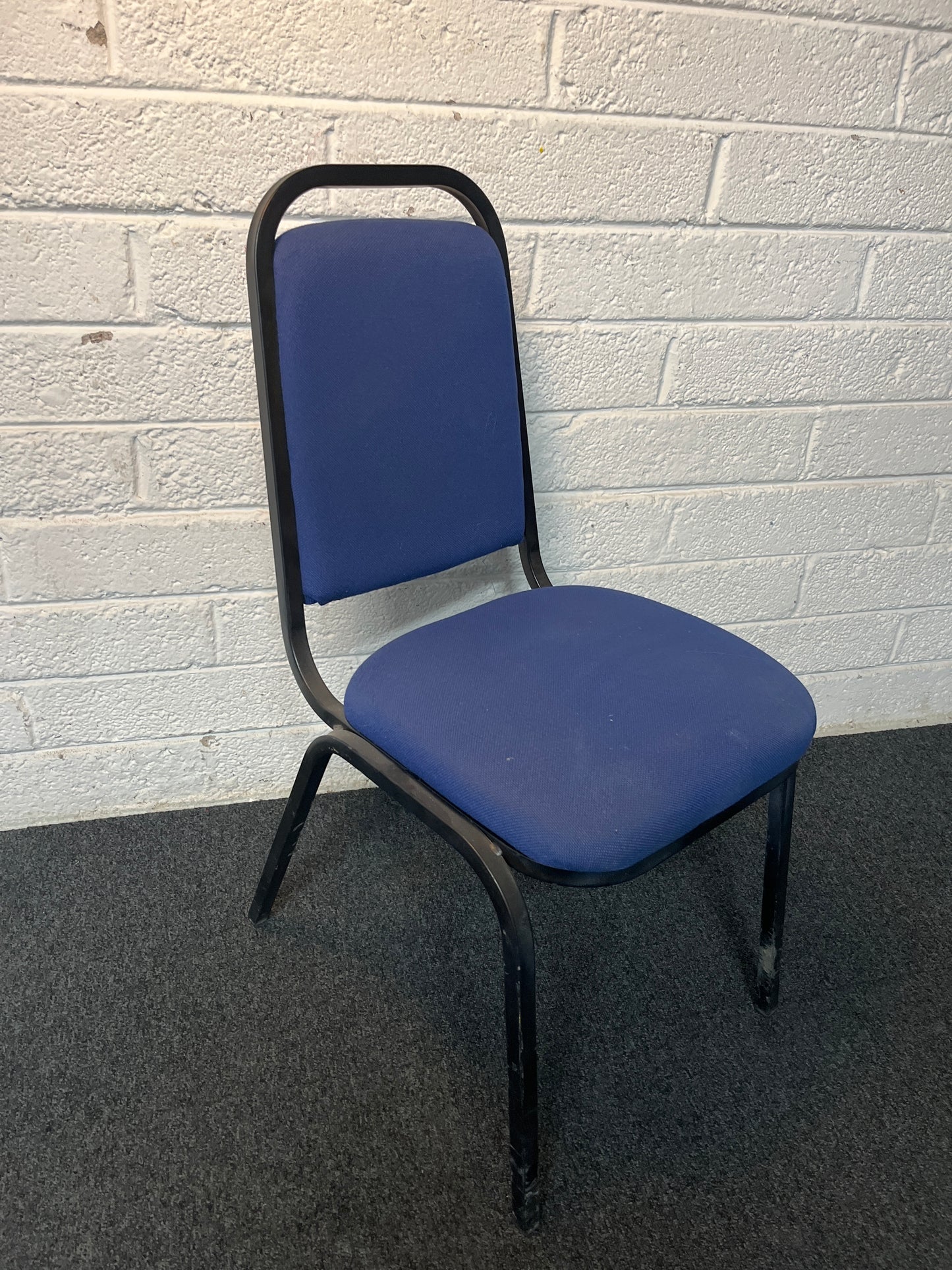 SECONDHAND black metal blue fabric stacking chair